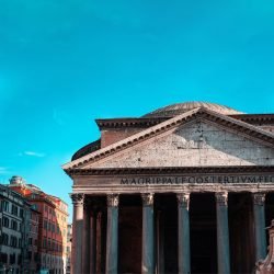 Stunning view of the Pantheon's facade in Rome with a clear blue sky.